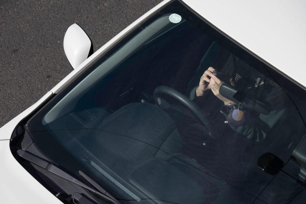 A driver caught using phone by a camera in Australia