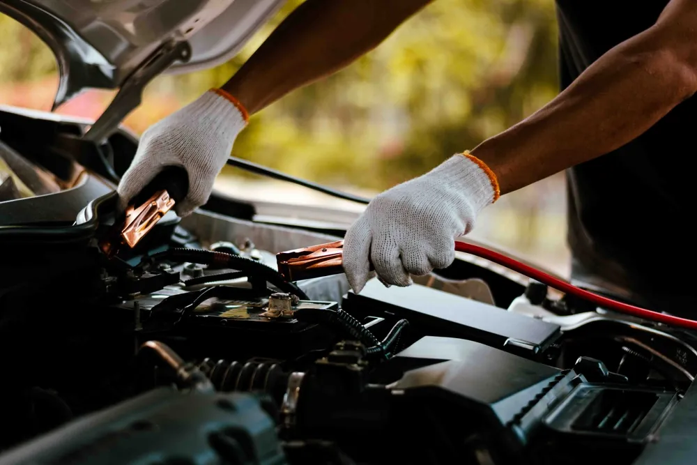Charge car battery with jumper cables.
